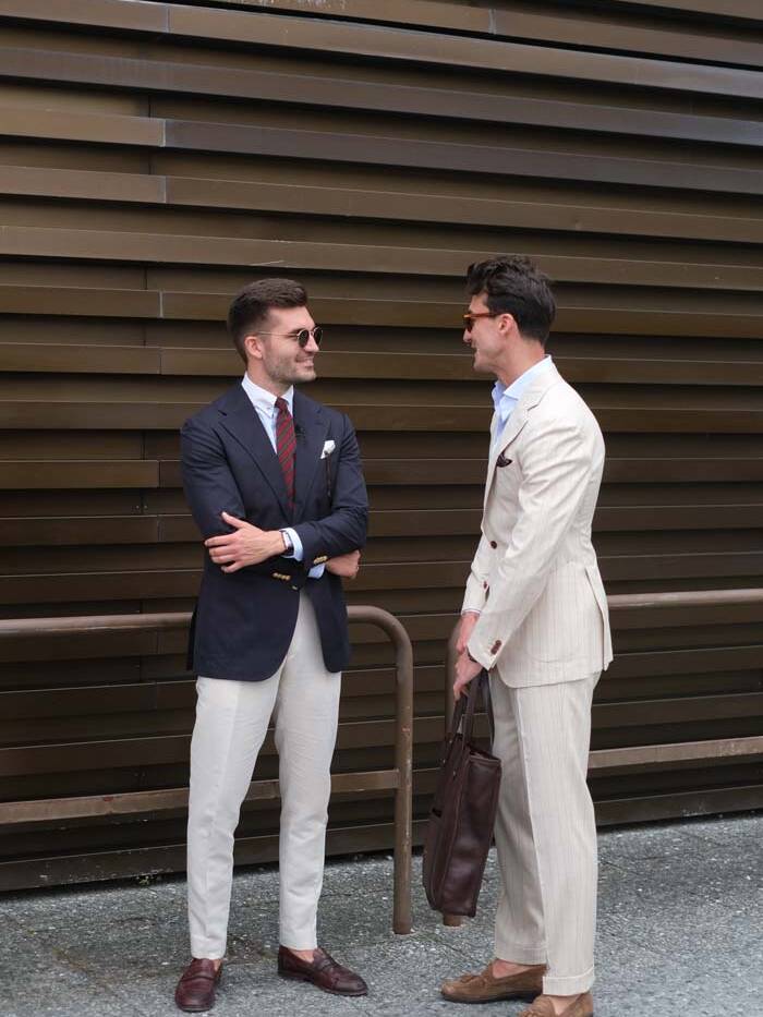 two men in stylish suits at pitty uomo