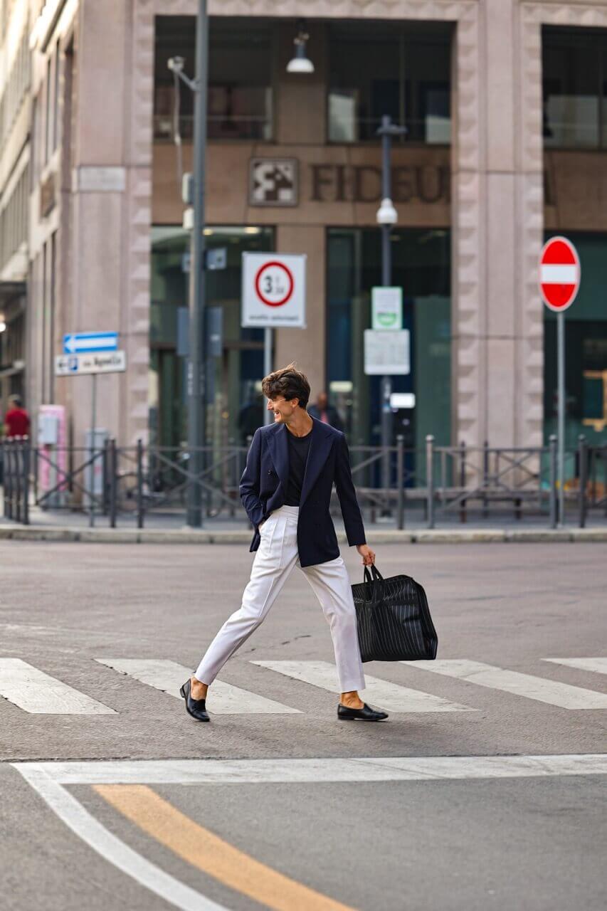 a man with a combination of blue and white clothing