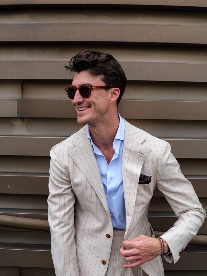 a man with a beautiful example of how to wear a pocket square