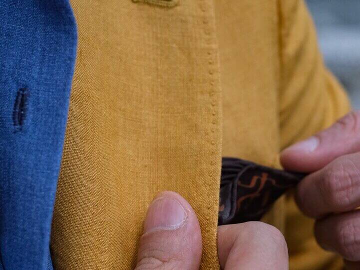 pocket square style on a yellow jacket