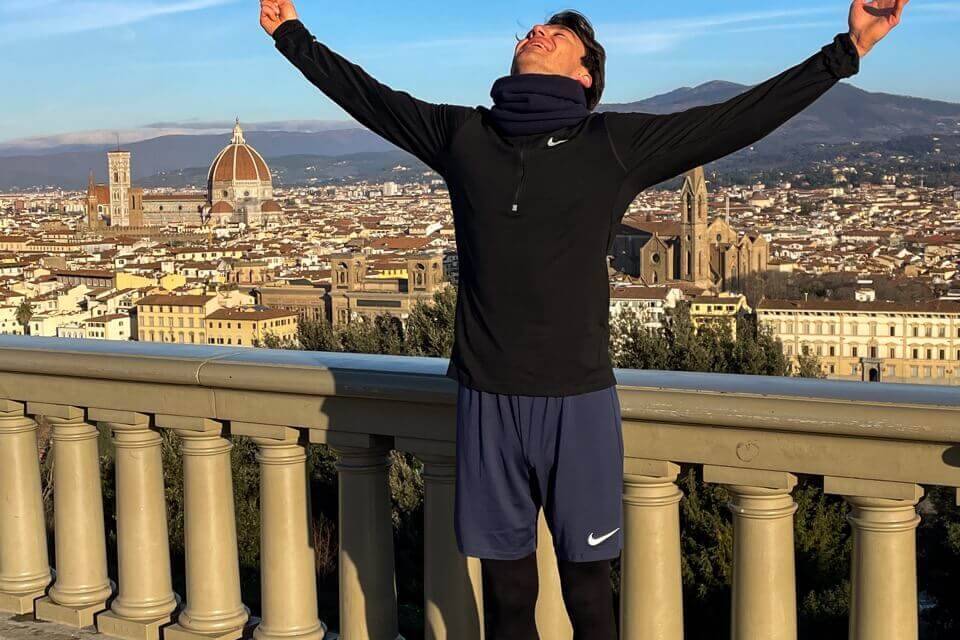 man in gym clothes on a beautiful background