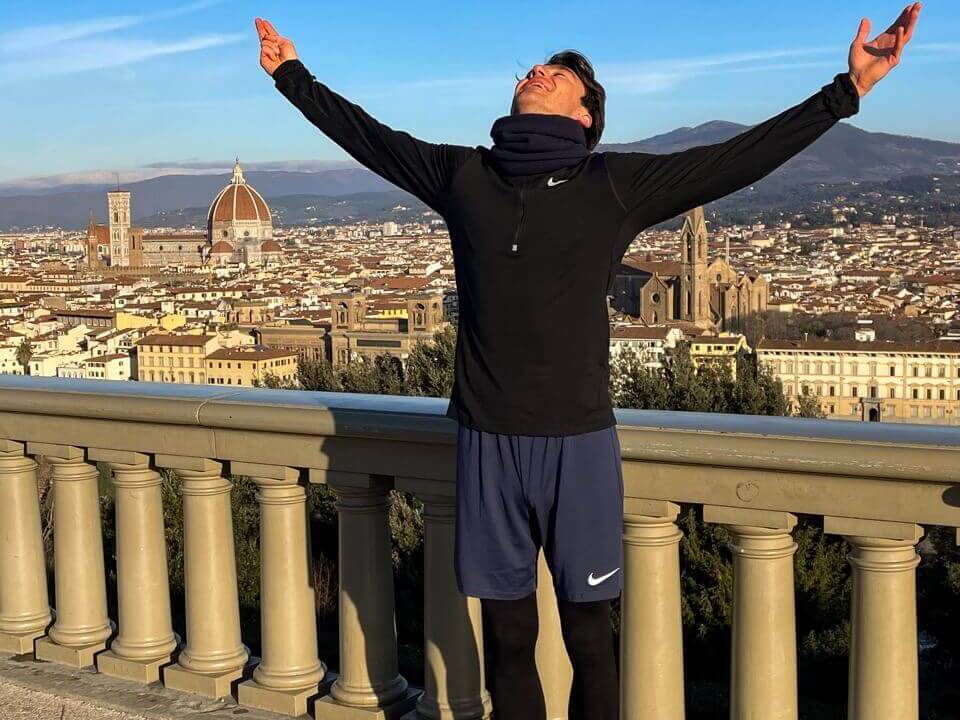 man in gym clothes on a beautiful background